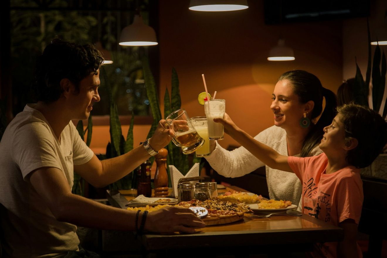 Guests seated at a table late in the evening